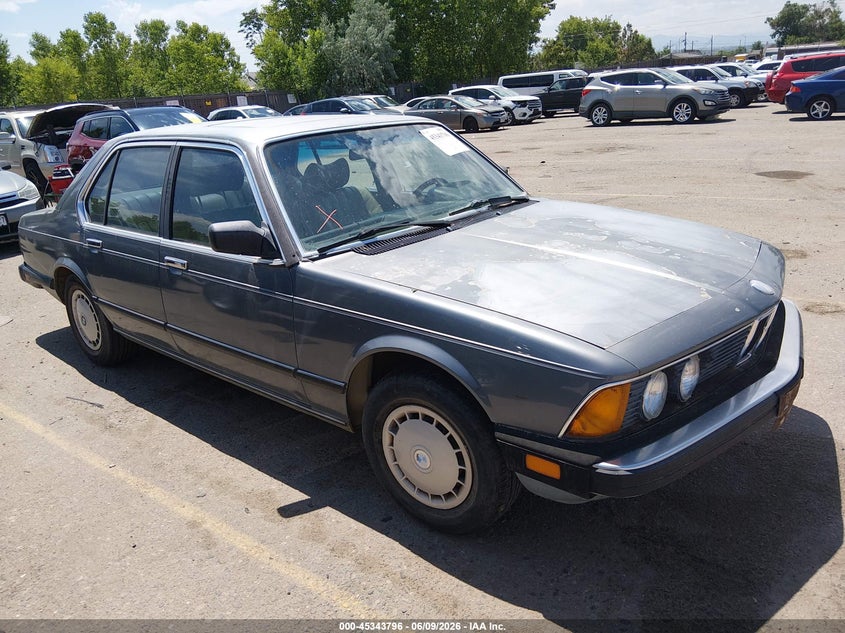 1984 BMW 7er VIN WBAFF740XE7398065 IAAI salvage auction — NORMAL WEAR, Clear (Colorado), sold $1,100 on 2026-07-07 (photo 1)