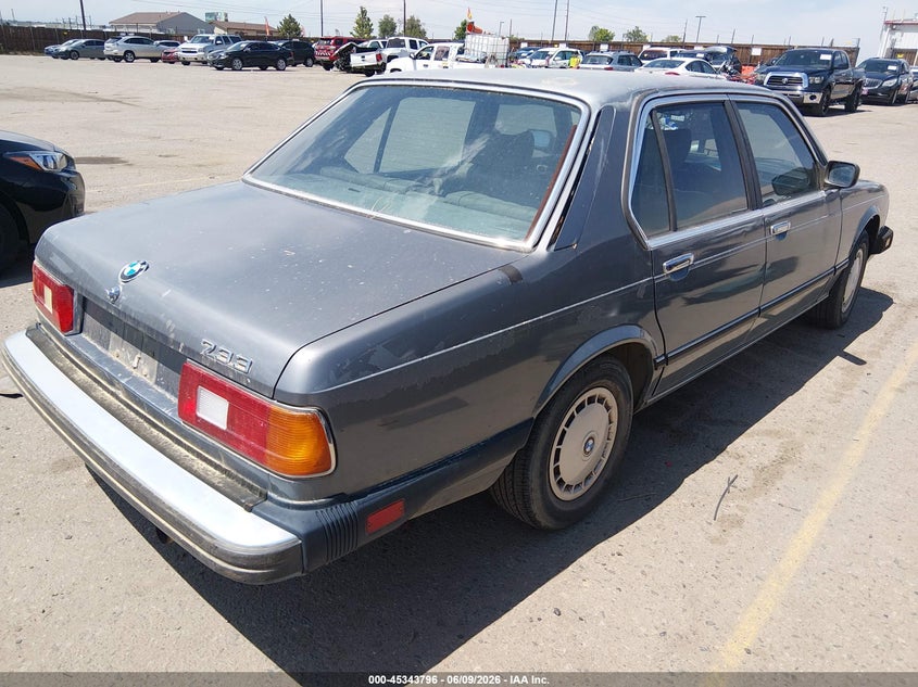 1984 BMW 7er VIN WBAFF740XE7398065 IAAI salvage auction — NORMAL WEAR, Clear (Colorado), sold $1,100 on 2026-07-07 (photo 4)