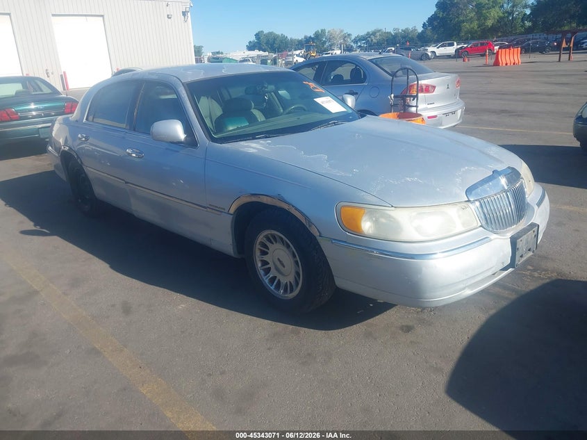 1999 Lincoln TOWN CAR VIN 1LNHM83W3XY641673 IAAI salvage auction — FRONT & REAR, Clear (Utah), sold $275 on 2026-07-09 (photo 1)