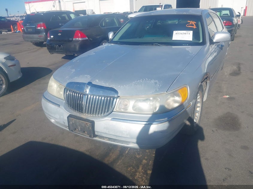 1999 Lincoln TOWN CAR VIN 1LNHM83W3XY641673 IAAI salvage auction — FRONT & REAR, Clear (Utah), sold $275 on 2026-07-09 (photo 6)