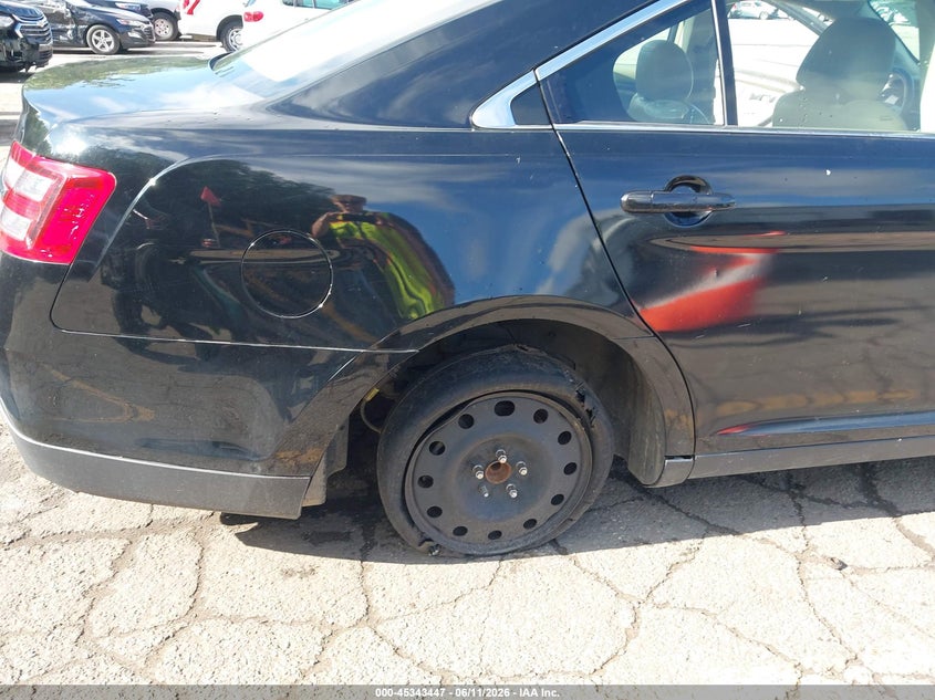 2018 Ford Taurus VIN 1FAHP2F88JG120425 IAAI salvage auction — NORMAL WEAR, Previous Salvage (Michigan), sold $1,000 on 2026-07-06 (photo 6)