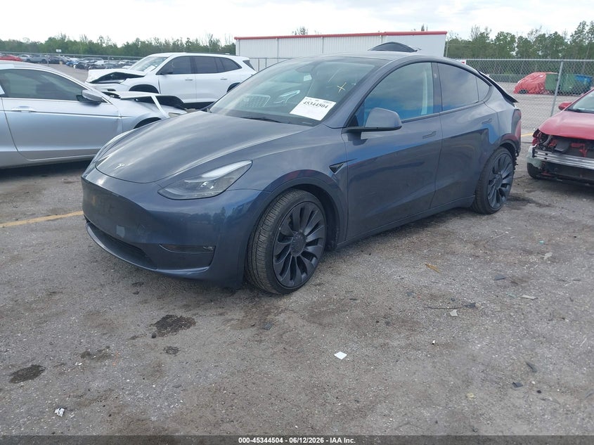 2023 Tesla Model y VIN 7SAYGDEF4PF861702 IAAI salvage auction — REAR END, Salvage Title, sold $13,150 on 2026-07-30 (photo 2)