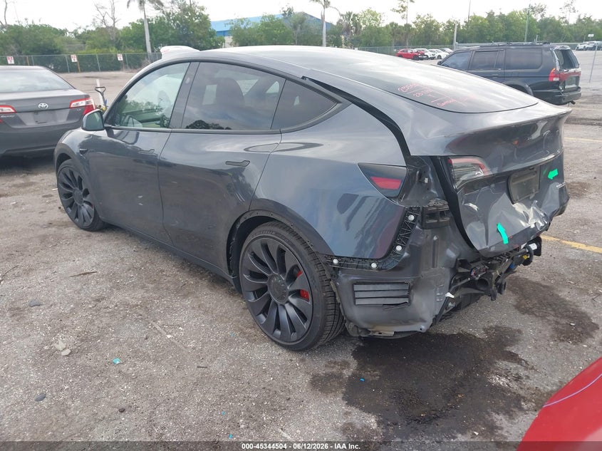 2023 Tesla Model y VIN 7SAYGDEF4PF861702 IAAI salvage auction — REAR END, Salvage Title, sold $13,150 on 2026-07-30 (photo 3)