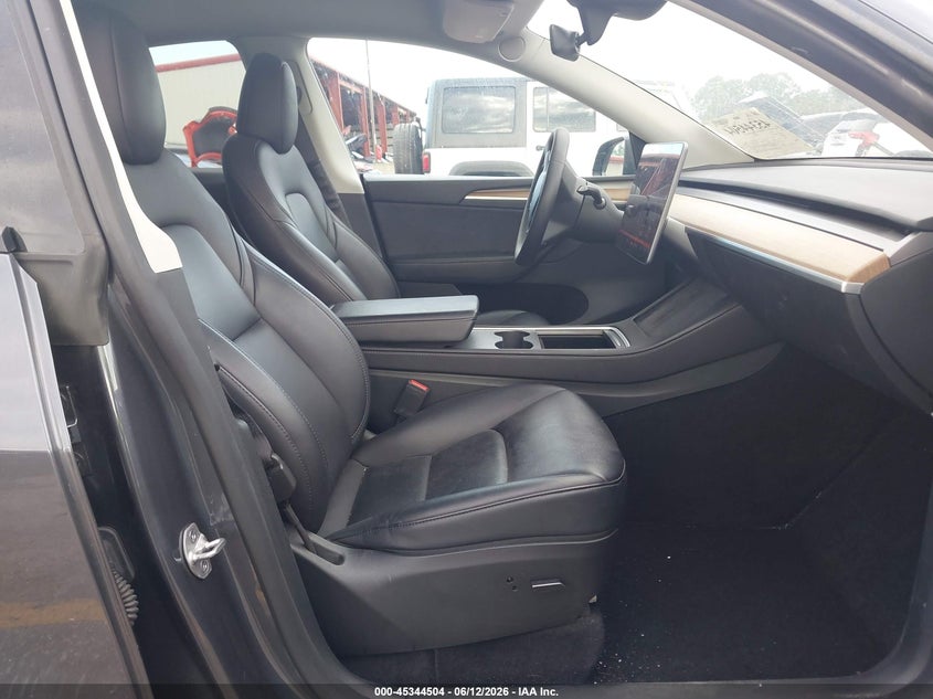 2023 Tesla Model y VIN 7SAYGDEF4PF861702 IAAI salvage auction — REAR END, Salvage Title, sold $13,150 on 2026-07-30 (photo 5)
