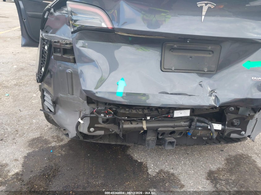 2023 Tesla Model y VIN 7SAYGDEF4PF861702 IAAI salvage auction — REAR END, Salvage Title, sold $13,150 on 2026-07-30 (photo 6)