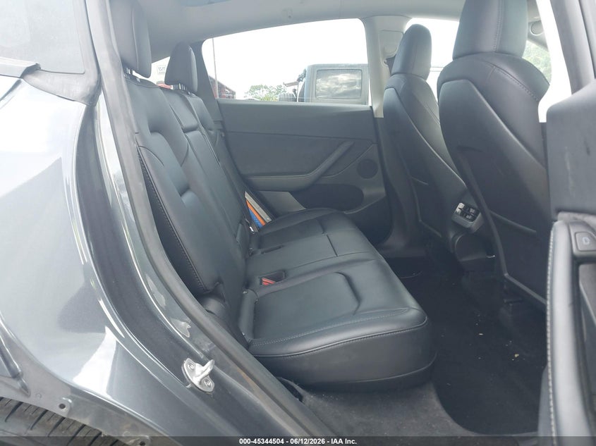 2023 Tesla Model y VIN 7SAYGDEF4PF861702 IAAI salvage auction — REAR END, Salvage Title, sold $13,150 on 2026-07-30 (photo 8)