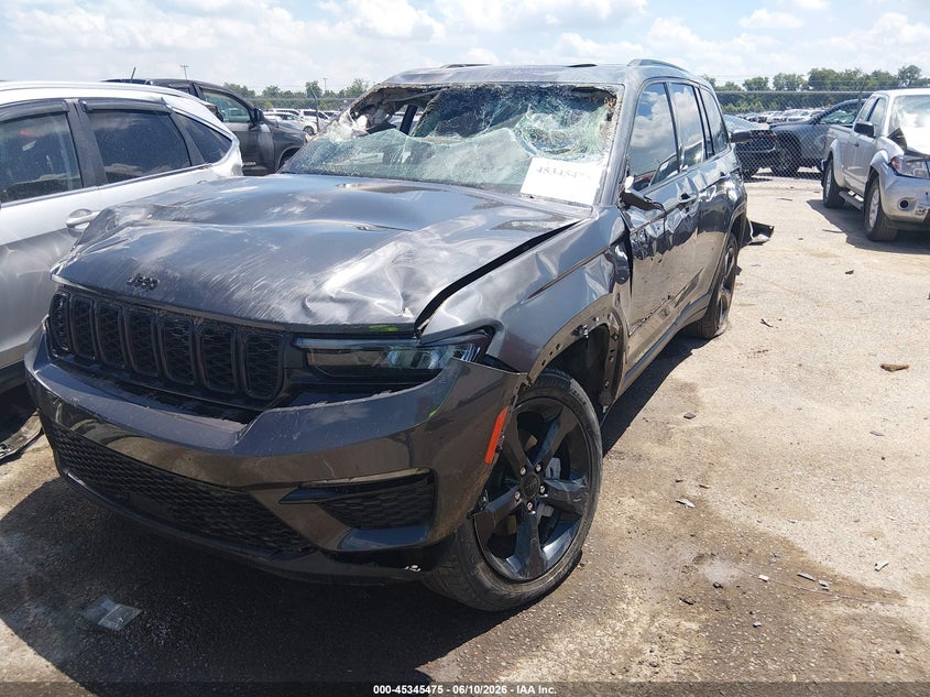 2023 Jeep Grand cherokee VIN 1C4RJGBG7PC663517 IAAI salvage auction — ROLLOVER, Salvage Title, sold $2,650 on 2026-08-27 (photo 2)