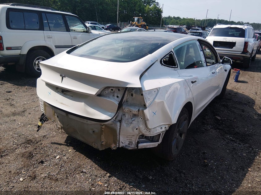 2023 Tesla Model 3 VIN 5YJ3E1EAXPF499911 IAAI salvage auction — REAR END, Salvage Title, sold $6,100 on 2026-07-23 (photo 4)