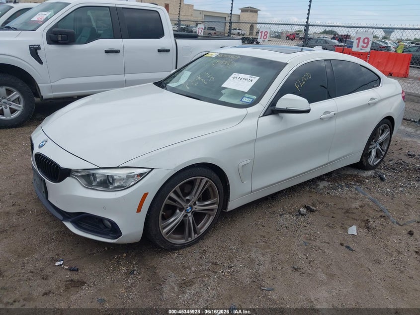 2016 BMW 4er VIN WBA4A9C57GG696154 IAAI salvage auction — WATER/FLOOD, Salvage (Texas), sold $1,300 on 2026-07-20 (photo 2)