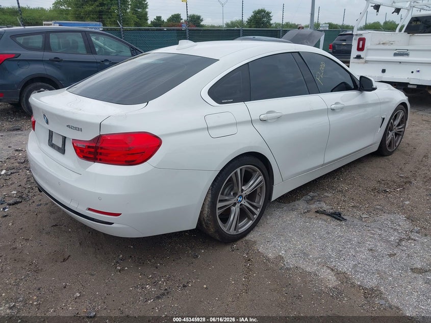 2016 BMW 4er VIN WBA4A9C57GG696154 IAAI salvage auction — WATER/FLOOD, Salvage (Texas), sold $1,300 on 2026-07-20 (photo 4)