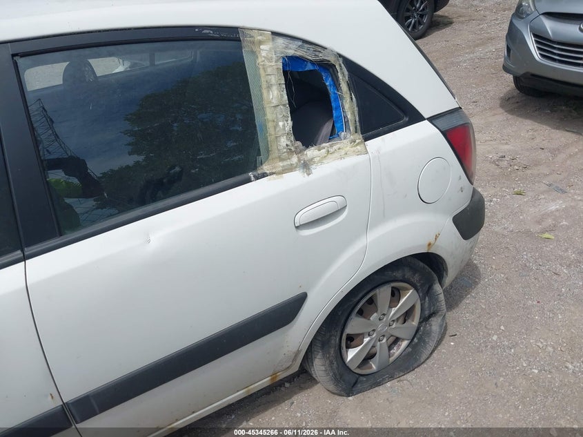 2008 Kia Rio VIN KNADE163086313226 IAAI salvage auction — LEFT SIDE, Salvage (Indiana), sold $300 on 2026-07-08 (photo 6)