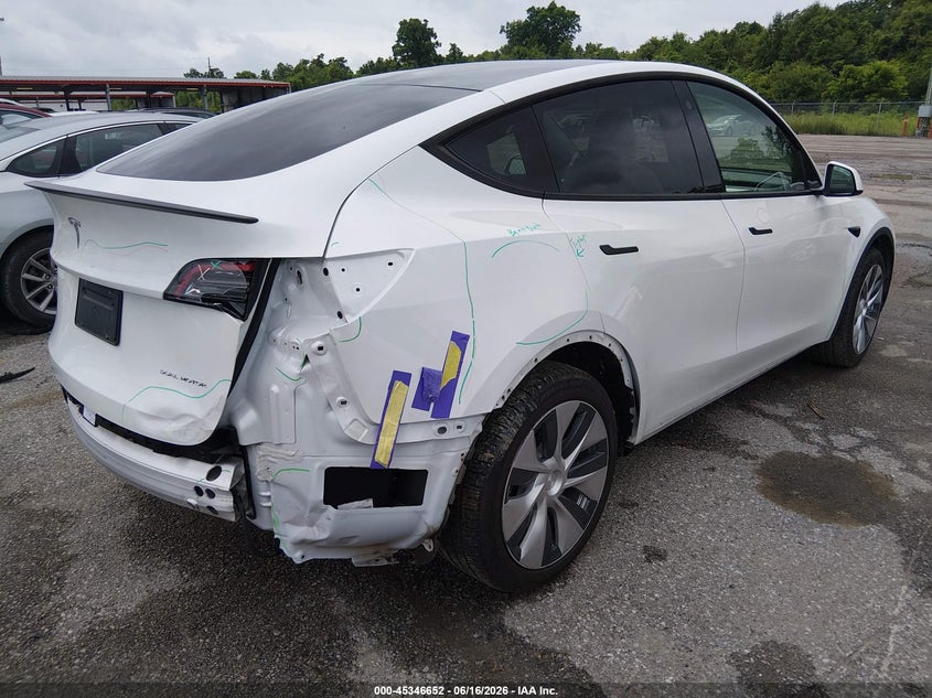 2022 Tesla Model y VIN 7SAYGDEE1NF313094 IAAI salvage auction — REAR END, Salvage (Louisiana), sold $12,600 on 2026-07-15 (photo 4)