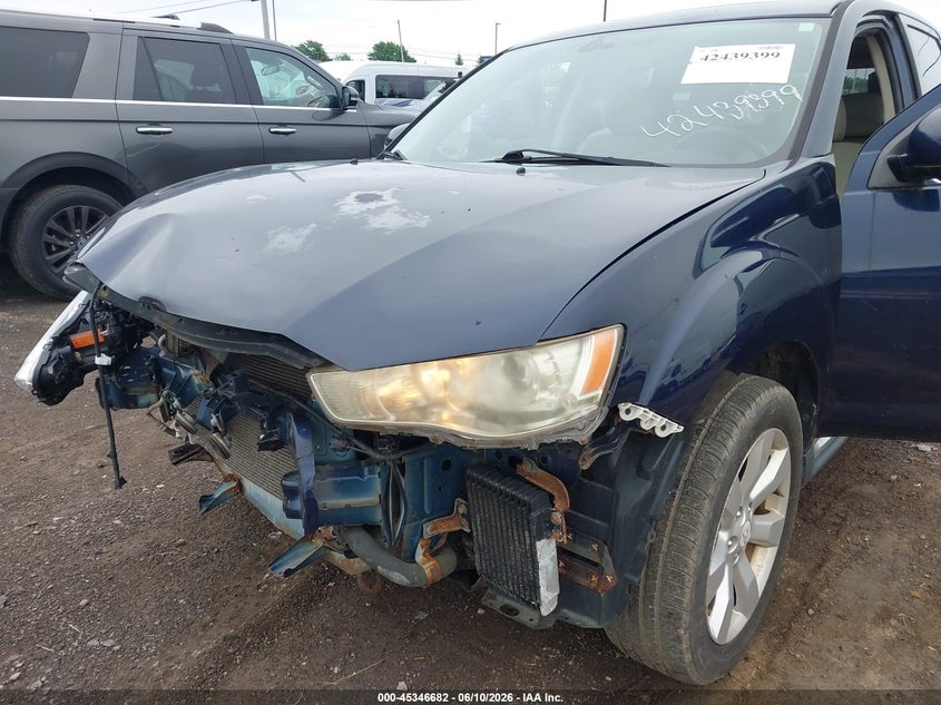 2010 Mitsubishi Outlander VIN JA4JT5AX6AZ012035 IAAI salvage auction — FRONT END, Clear (Massachusetts), sold $325 on 2026-07-08 (photo 6)
