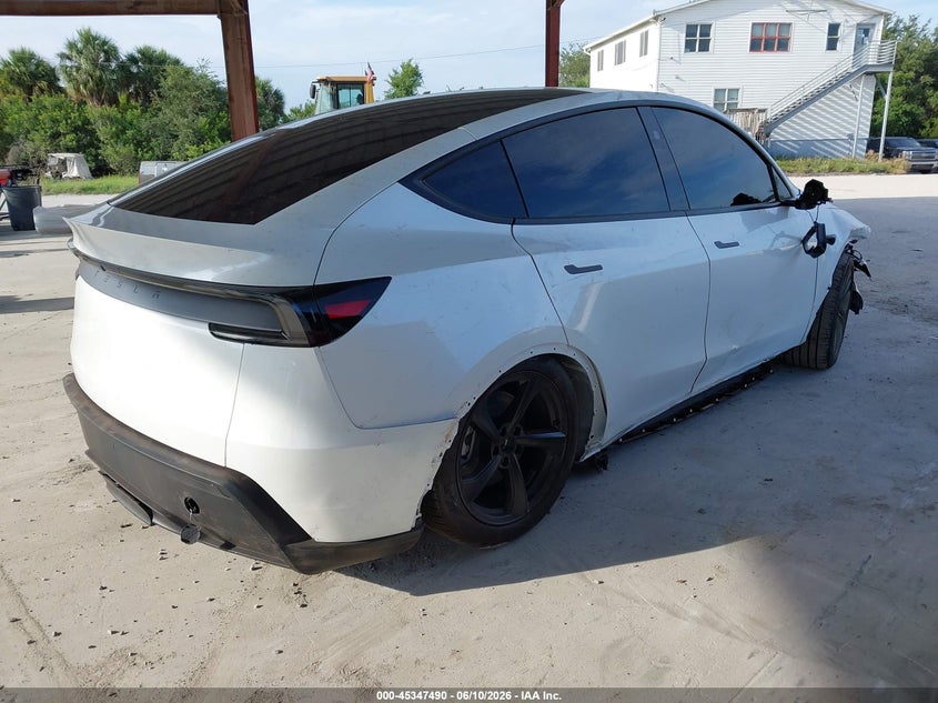2026 Tesla Model y VIN 7SAYGDED4TA690987 IAAI salvage auction — FRONT & REAR, Salvage Title, sold $11,600 on 2026-07-23 (photo 4)