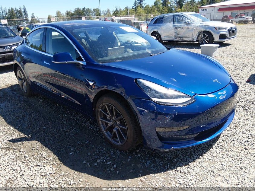 2018 Tesla Model 3 VIN 5YJ3E1EA5JF019443 — IAAI salvage auction photo