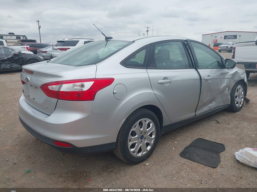 2012 Ford Focus VIN 1FAHP3F27CL140581 IAAI salvage auction — SIDE, Salvage (Texas), sold $700 on 2026-07-09 (photo 4)