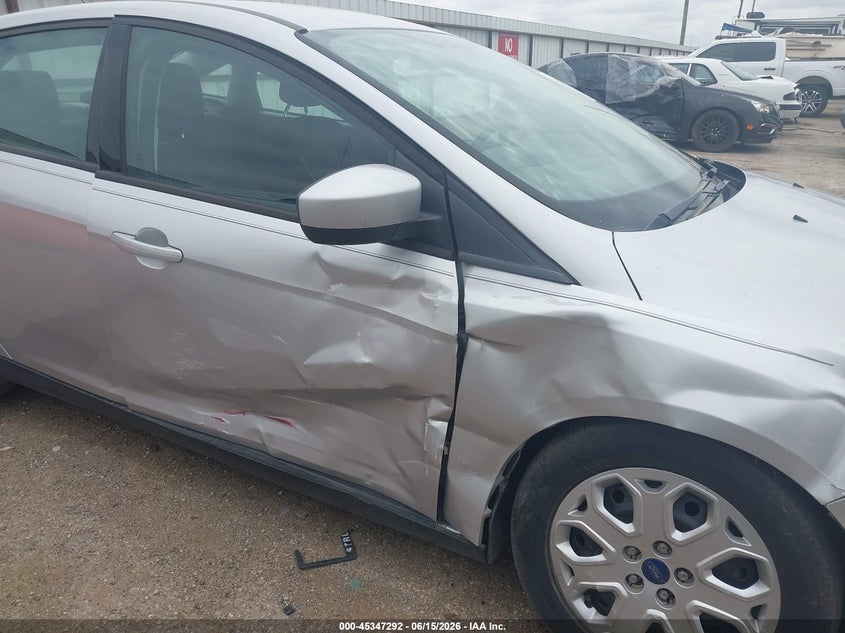 2012 Ford Focus VIN 1FAHP3F27CL140581 IAAI salvage auction — SIDE, Salvage (Texas), sold $700 on 2026-07-09 (photo 6)