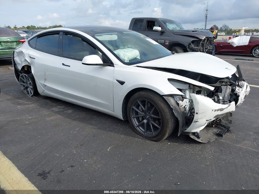 2021 Tesla Model 3 VIN 5YJ3E1EA2MF908558 IAAI salvage auction — FRONT & REAR, Salvage Title, sold $1,650 on 2026-07-17 (photo 1)