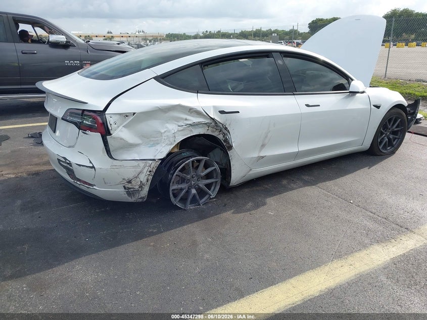 2021 Tesla Model 3 VIN 5YJ3E1EA2MF908558 IAAI salvage auction — FRONT & REAR, Salvage Title, sold $1,650 on 2026-07-17 (photo 4)