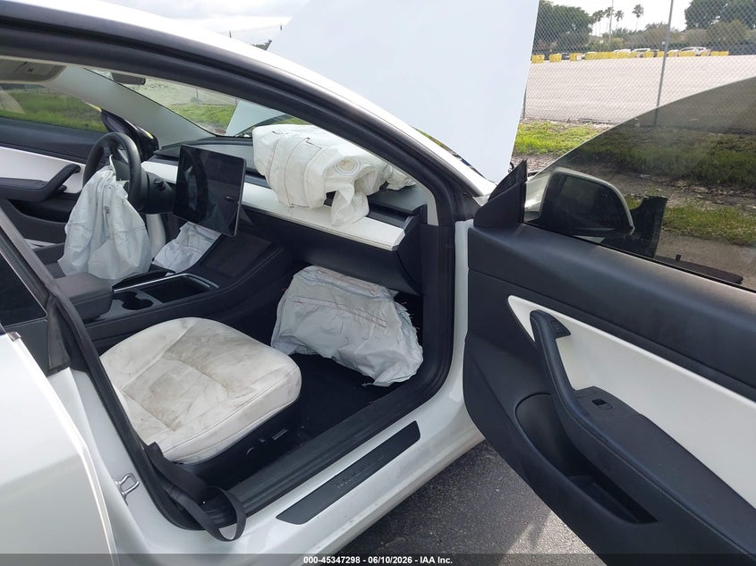 2021 Tesla Model 3 VIN 5YJ3E1EA2MF908558 IAAI salvage auction — FRONT & REAR, Salvage Title, sold $1,650 on 2026-07-17 (photo 5)