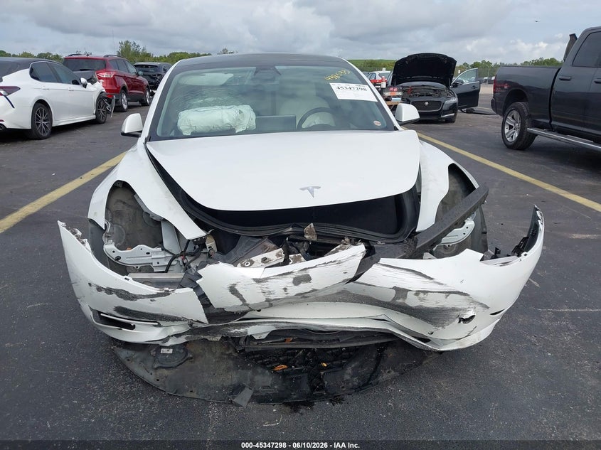 2021 Tesla Model 3 VIN 5YJ3E1EA2MF908558 IAAI salvage auction — FRONT & REAR, Salvage Title, sold $1,650 on 2026-07-17 (photo 6)