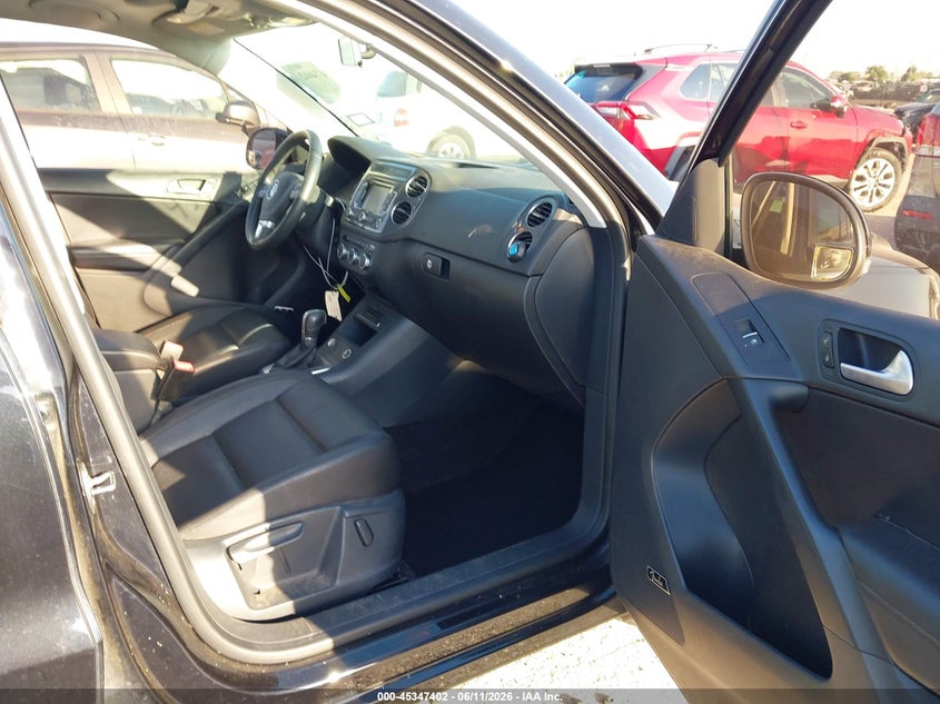 2014 Volkswagen Tiguan VIN WVGAV3AX2EW569614 IAAI salvage auction — WATER/FLOOD, Salvage (Texas), sold $500 on 2026-07-28 (photo 5)