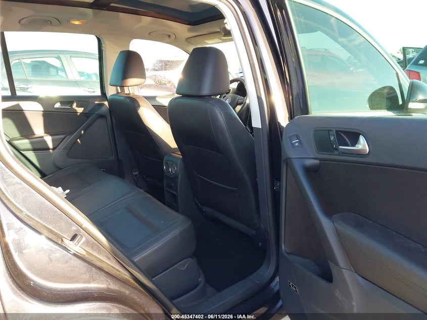 2014 Volkswagen Tiguan VIN WVGAV3AX2EW569614 IAAI salvage auction — WATER/FLOOD, Salvage (Texas), sold $500 on 2026-07-28 (photo 8)