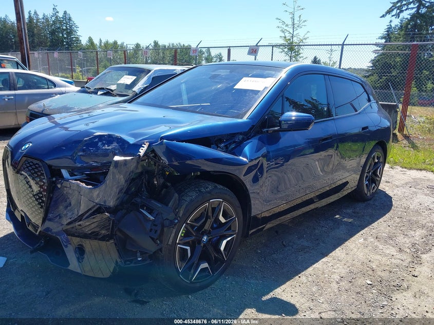 2023 BMW Ix VIN WB533CF03PCM07831 IAAI salvage auction — LEFT FRONT, Bill Of Sale (Washington), sold $37,125 on 2026-07-09 (photo 2)