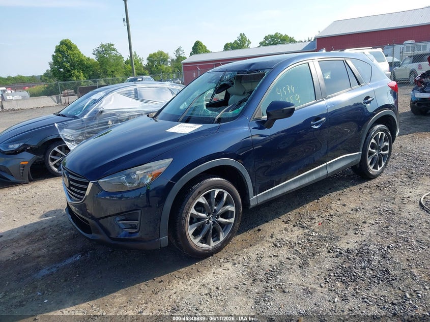 2016 Mazda Cx-5 VIN JM3KE4DY1G0805637 IAAI salvage auction — ROOF, Salvage Title, sold $3,900 on 2026-07-21 (photo 2)