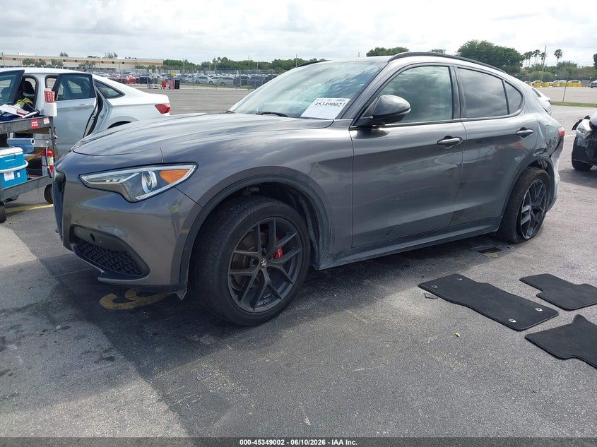 2019 Alfa romeo Stelvio VIN ZASPAKANXK7C71960 IAAI salvage auction — SIDE, Salvage Title, sold $1,550 on 2026-07-30 (photo 2)