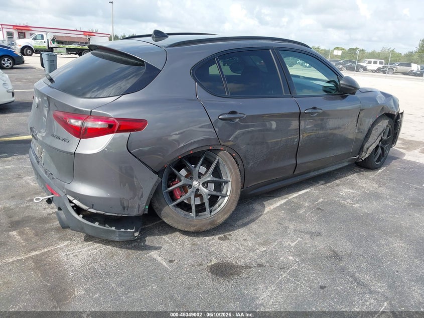 2019 Alfa romeo Stelvio VIN ZASPAKANXK7C71960 IAAI salvage auction — SIDE, Salvage Title, sold $1,550 on 2026-07-30 (photo 4)