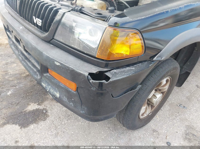 1998 Mitsubishi Montero VIN JA4LS31P3WP016417 IAAI salvage auction — REAR END, Rebuildable (Florida), sold $300 on 2026-07-08 (photo 6)