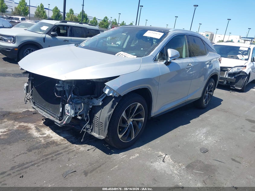 2017 Lexus Rx VIN 2T2ZZMCAXHC038826 IAAI salvage auction — FRONT & REAR, Salvage Certificate (California), sold $11,100 on 2026-07-10 (photo 2)