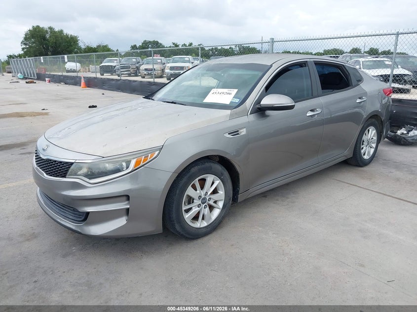 2016 Kia Optima VIN 5XXGT4L39GG033929 IAAI salvage auction — NORMAL WEAR, Original (Texas), sold $850 on 2026-07-23 (photo 2)