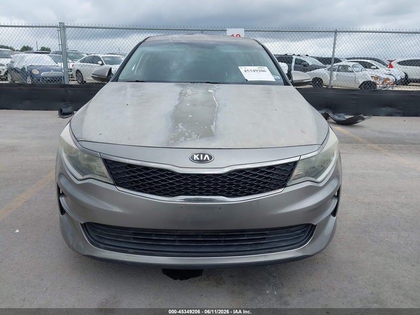 2016 Kia Optima VIN 5XXGT4L39GG033929 IAAI salvage auction — NORMAL WEAR, Original (Texas), sold $850 on 2026-07-23 (photo 6)