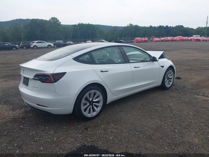 2022 Tesla Model 3 VIN 5YJ3E1EB9NF253809 IAAI salvage auction — FRONT END, Salvage Title, sold $7,700 on 2026-07-29 (photo 4)