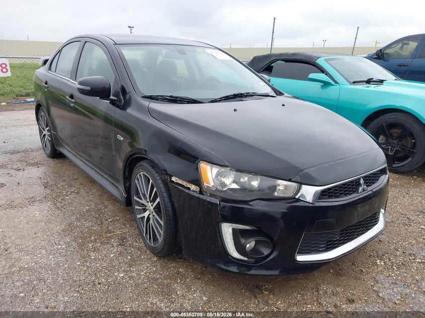 2016 Mitsubishi Lancer VIN JA32U8FW6GU008824 IAAI salvage auction — NORMAL WEAR, Original (Texas), sold $1,400 on 2026-07-20 (photo 1)