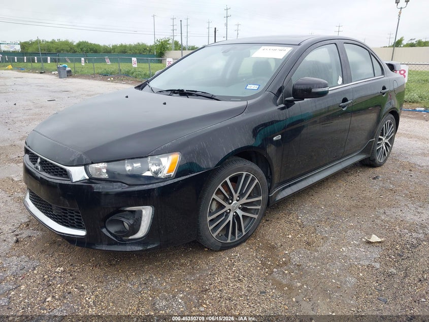 2016 Mitsubishi Lancer VIN JA32U8FW6GU008824 IAAI salvage auction — NORMAL WEAR, Original (Texas), sold $1,400 on 2026-07-20 (photo 2)