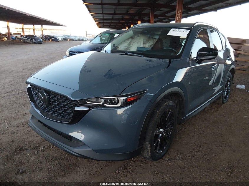 2023 Mazda Cx-5 VIN JM3KFBCM8P0180900 IAAI salvage auction — SIDE, Salvage Title, sold $6,200 on 2026-07-21 (photo 2)