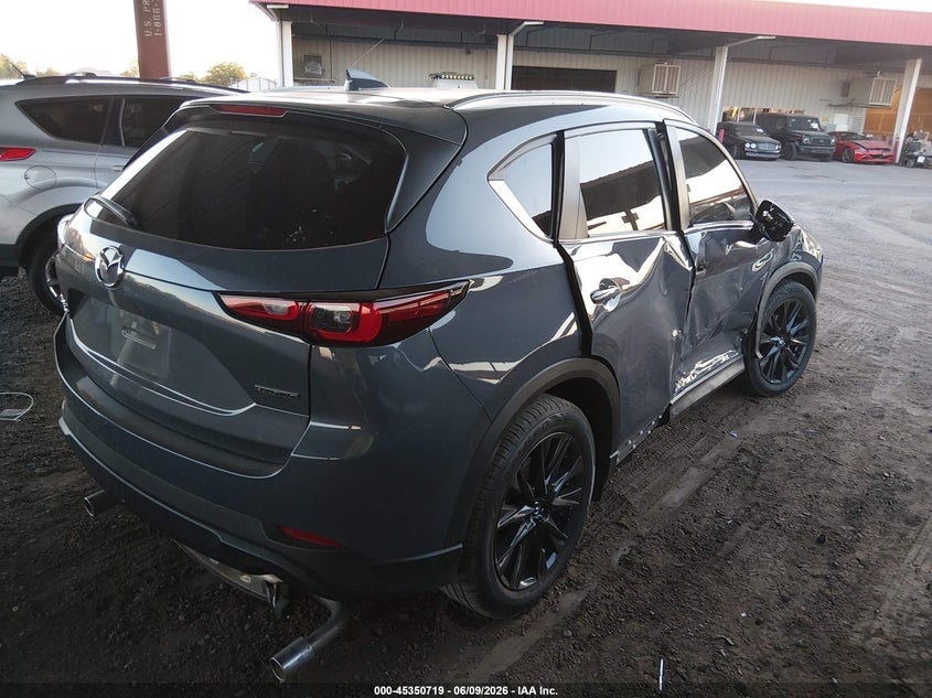 2023 Mazda Cx-5 VIN JM3KFBCM8P0180900 IAAI salvage auction — SIDE, Salvage Title, sold $6,200 on 2026-07-21 (photo 4)