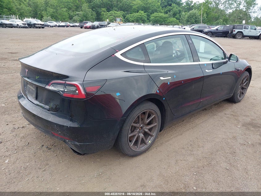 2019 Tesla Model 3 VIN 5YJ3E1EA4KF425764 IAAI salvage auction — SIDE, Salvage (Idaho), sold $5,700 on 2026-07-09 (photo 4)