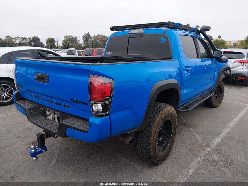 2019 Toyota Tacoma VIN 5TFCZ5AN5KX182976 IAAI salvage auction — RIGHT FRONT, Salvage (California), sold $15,000 on 2026-08-06 (photo 4)