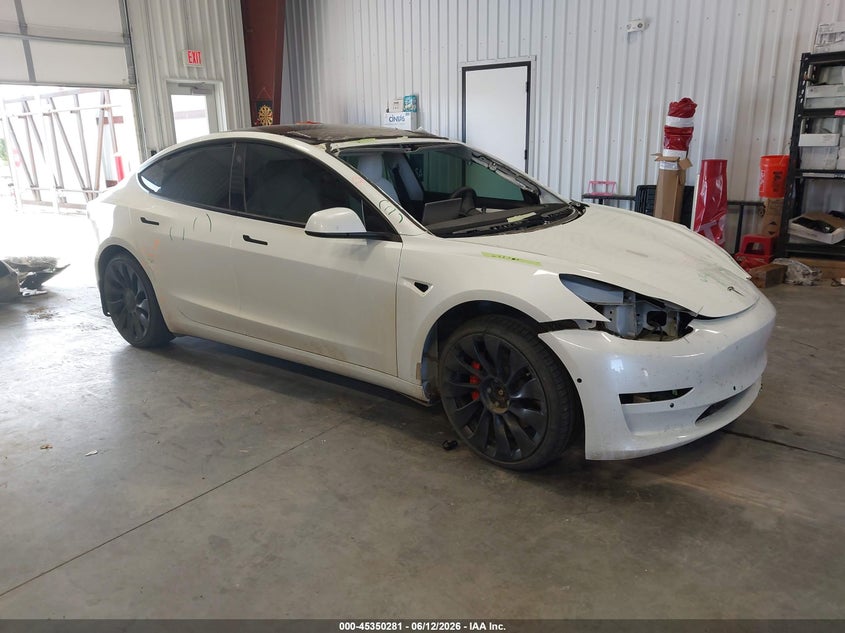 2022 Tesla Model 3 VIN 5YJ3E1EC2NF312563 — IAAI salvage auction photo