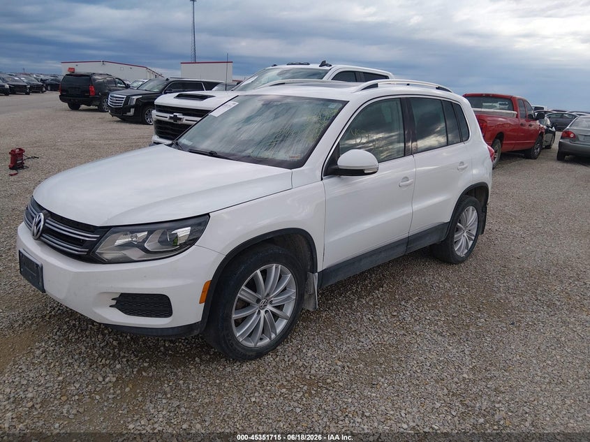 2016 Volkswagen Tiguan VIN WVGBV7AX4GW529615 IAAI salvage auction — NORMAL WEAR, Repossessed (Missouri), sold $500 on 2026-08-06 (photo 2)