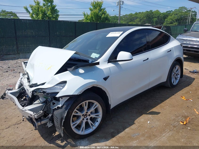 2023 Tesla Model y VIN 7SAYGDEEXPA083877 IAAI salvage auction — FRONT END, Salvage Title, sold $9,000 on 2026-07-23 (photo 2)