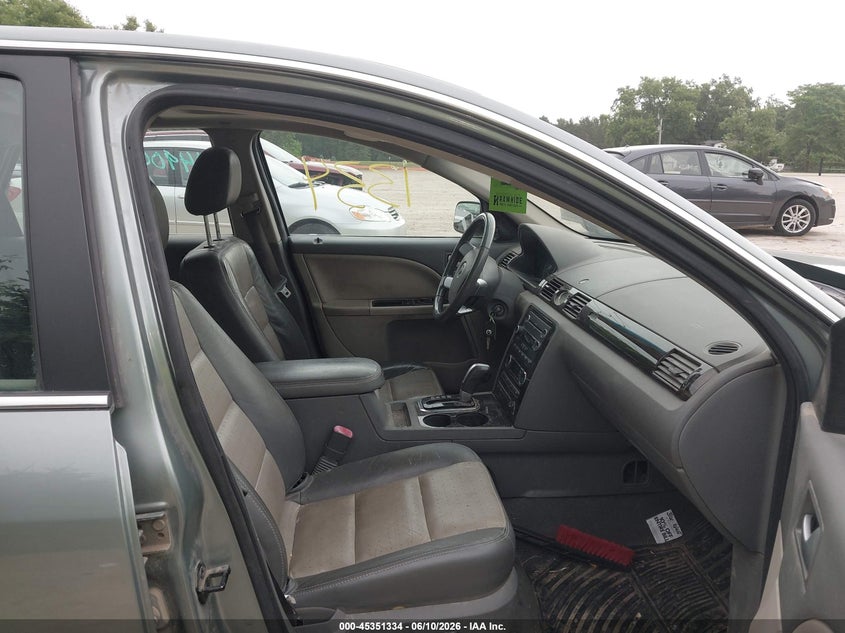 2008 Mercury Sable VIN 1MEHM42WX8G602986 IAAI salvage auction — NORMAL WEAR, Clear-Endorsement (Wisconsin), sold $500 on 2026-09-04 (photo 5)