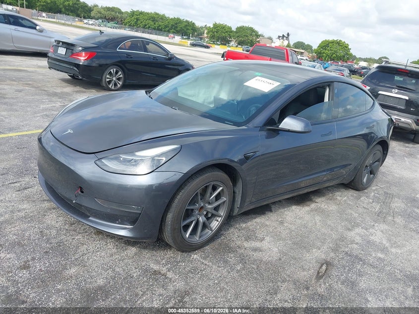 2021 Tesla Model 3 VIN 5YJ3E1EA5MF991452 IAAI salvage auction — NORMAL WEAR, Salvage (Florida), sold $5,575 on 2026-07-09 (photo 2)