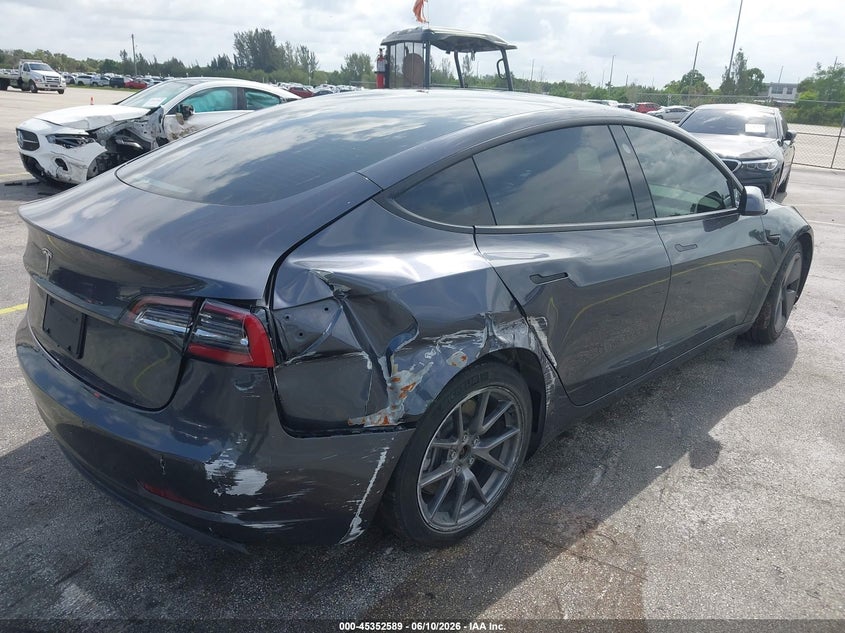 2021 Tesla Model 3 VIN 5YJ3E1EA5MF991452 IAAI salvage auction — NORMAL WEAR, Salvage (Florida), sold $5,575 on 2026-07-09 (photo 6)
