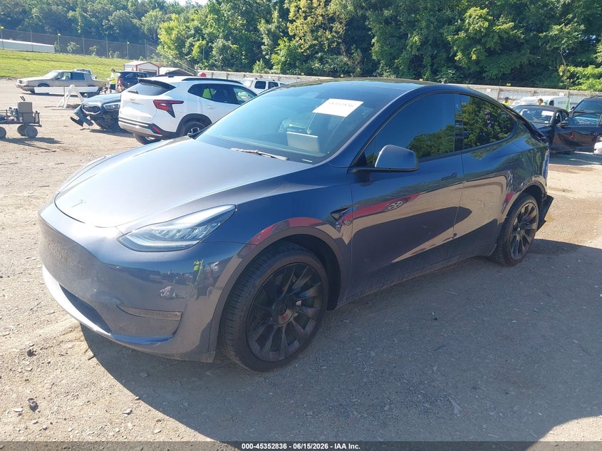 2023 Tesla Model y VIN 7SAYGDEE6PA050584 IAAI salvage auction — REAR END, Salvage Title, sold $10,000 on 2026-07-26 (photo 2)