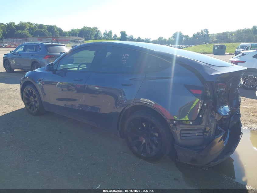 2023 Tesla Model y VIN 7SAYGDEE6PA050584 IAAI salvage auction — REAR END, Salvage Title, sold $10,000 on 2026-07-26 (photo 3)